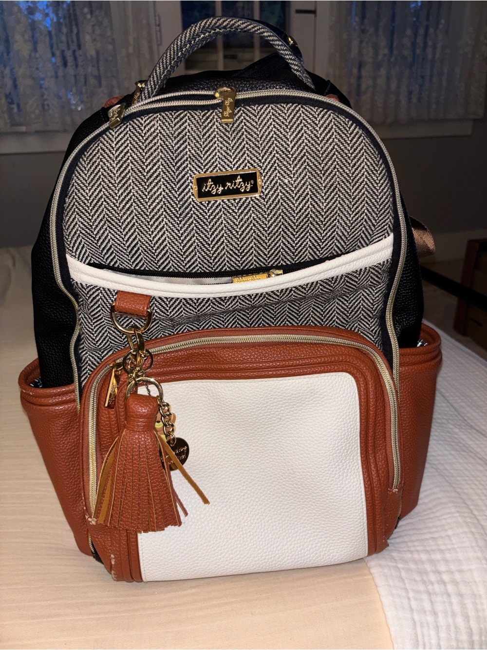 Itzy Ritzy Coffee & Cream Vegan Leather Diaper Backpack with Brown Trim